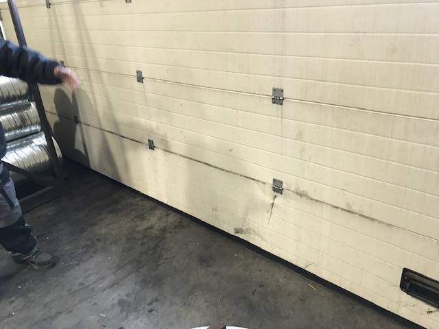 panneau porte sectionnelle Hormann accroché remplacé par Automatisations Services 13240