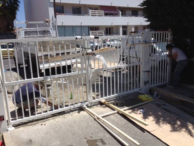 pose portail conforme aux normes