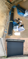 volet roulant de garage aluminium motorisé somfy lames xl 77X19 installé par automatisations services aux pennes mirabeau à côté de Marseille et septèmes